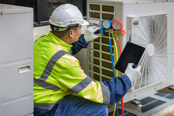 Professional Air Duct Cleaning technician working in Yadkinville, NC